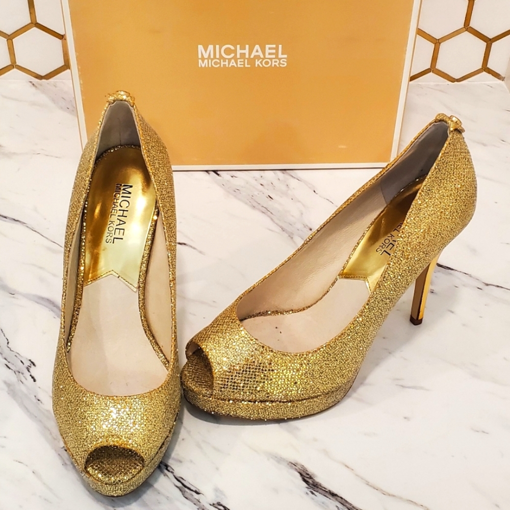 Michael Kors gold pumps